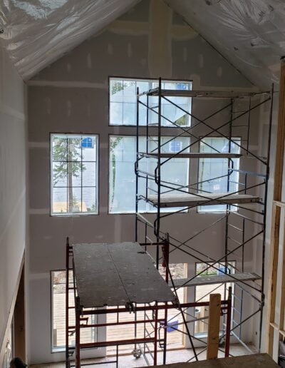 Drywall Installation Perfectly done around scaffolding. Drywall and taping in a new house.