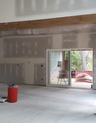 Drywall Installation Perfectly done around timber frames. Drywall and taping in a new house.